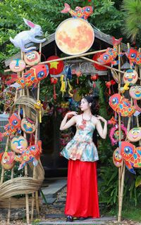 Vietnamese Mid-Autumn Charm: Girl in Traditional Attire with Vibrant Lantern | Festival Culture & Colors-16