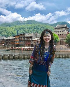 Discover Fenghuang Ancient Town: Serene boat ride, historic riverside charm.-2