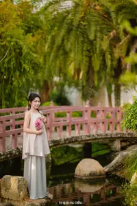 Graceful Young Woman in a Dreamy Garden: A Serene and Elegant Moment 1000025211-11