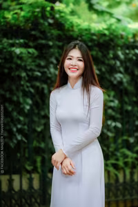 VGU No.87: Discover the captivating elegance of a Vietnamese girl in a pristine white Ao Dai.-0