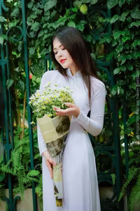 VGU No.87: Discover the captivating elegance of a Vietnamese girl in a pristine white Ao Dai.-7