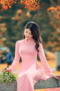 VGU No.20: Graceful Pink Ao Dai Muse Capturing Elegant Vietnamese Beauty Amidst Romantic Autumn Hues-7