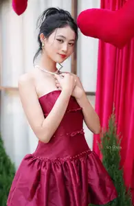 VGU No.187: Charming Woman in Red Dress Shines with Elegant Christmas Style. Discover Festive Fashion & Holiday Grace!-4