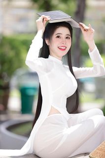 Vietnamese Beauty: Elegant Traditional White Ao Dai Woman with Conical Hat-11