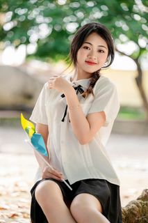 Pure White Shirt Schoolgirl | Innocent Beauty of Student Age with Colorful Pinwheel-1