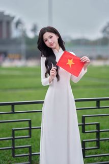 Elegant Vietnamese Woman in White Ao Dai, Conical Hat | Traditional Beauty-2