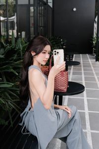 Elegant Woman and Adorable Pomeranian: Chic Fashion & Pet Joy.-1