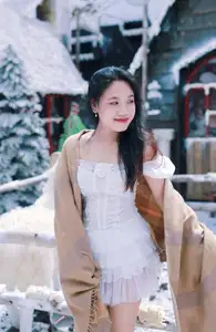 Radiant Beauty: Girl in Pristine White Dress Amidst Romantic Winter Wonderland 1000024890-1