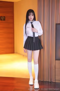 Irresistibly Alluring: Ruan Qing's Chic Uniform Style in XiuRen Photo Series No.10335-3