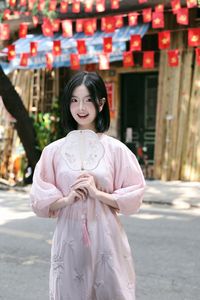 Elegant Vietnamese Girl on Red Lantern Street: Captivating Style & Cultural Charm-4