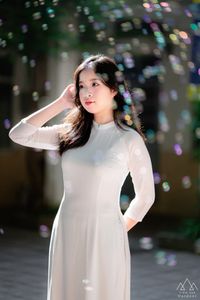 White Ao Dai Beauty: Vietnamese Girl with Vintage Camera-6