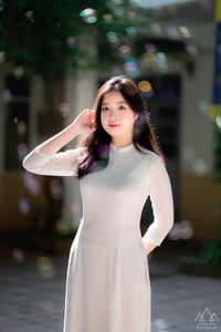 White Ao Dai Beauty: Vietnamese Girl with Vintage Camera-7
