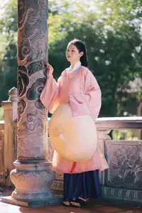Graceful Vietnamese Beauty: Young Woman in Traditional Attire, Embodying Cultural Heritage and Ao Dai Charm 1000024460-12