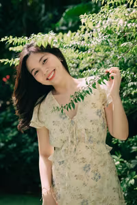 XVG No.48: A Beautiful Girl's Peaceful Moment in a Green Garden, Her Radiant Smile Reflecting Natural Beauty.-5