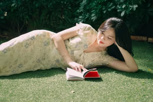 XVG No.48: A Beautiful Girl's Peaceful Moment in a Green Garden, Her Radiant Smile Reflecting Natural Beauty.-1