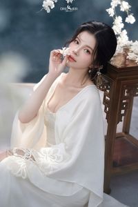 Discover Ethereal Grace: An Asian Beauty in Pure White Amidst Delicate White Blossoms-8