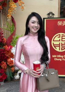 Radiant Vietnamese Beauty in Pink Ao Dai, Elegant Traditional Charm-1