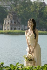 Elegant Beauty of a Girl by the Lake in Serene Natural Scenery-11
