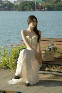 Elegant Beauty of a Girl by the Lake in Serene Natural Scenery-6