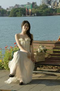Elegant Beauty of a Girl by the Lake in Serene Natural Scenery-3