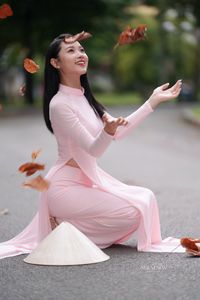 Pink Ao Dai Grace: Vietnamese Beauty with Elegant Girl and Traditional Conical Hat-8