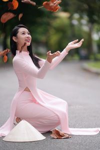 Pink Ao Dai Grace: Vietnamese Beauty with Elegant Girl and Traditional Conical Hat-13