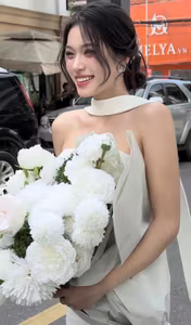 VGU No.8: Young Woman in White Dress with Pristine White Rose Bouquet and Charming Smile.-2