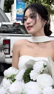 VGU No.8: Young Woman in White Dress with Pristine White Rose Bouquet and Charming Smile.-4